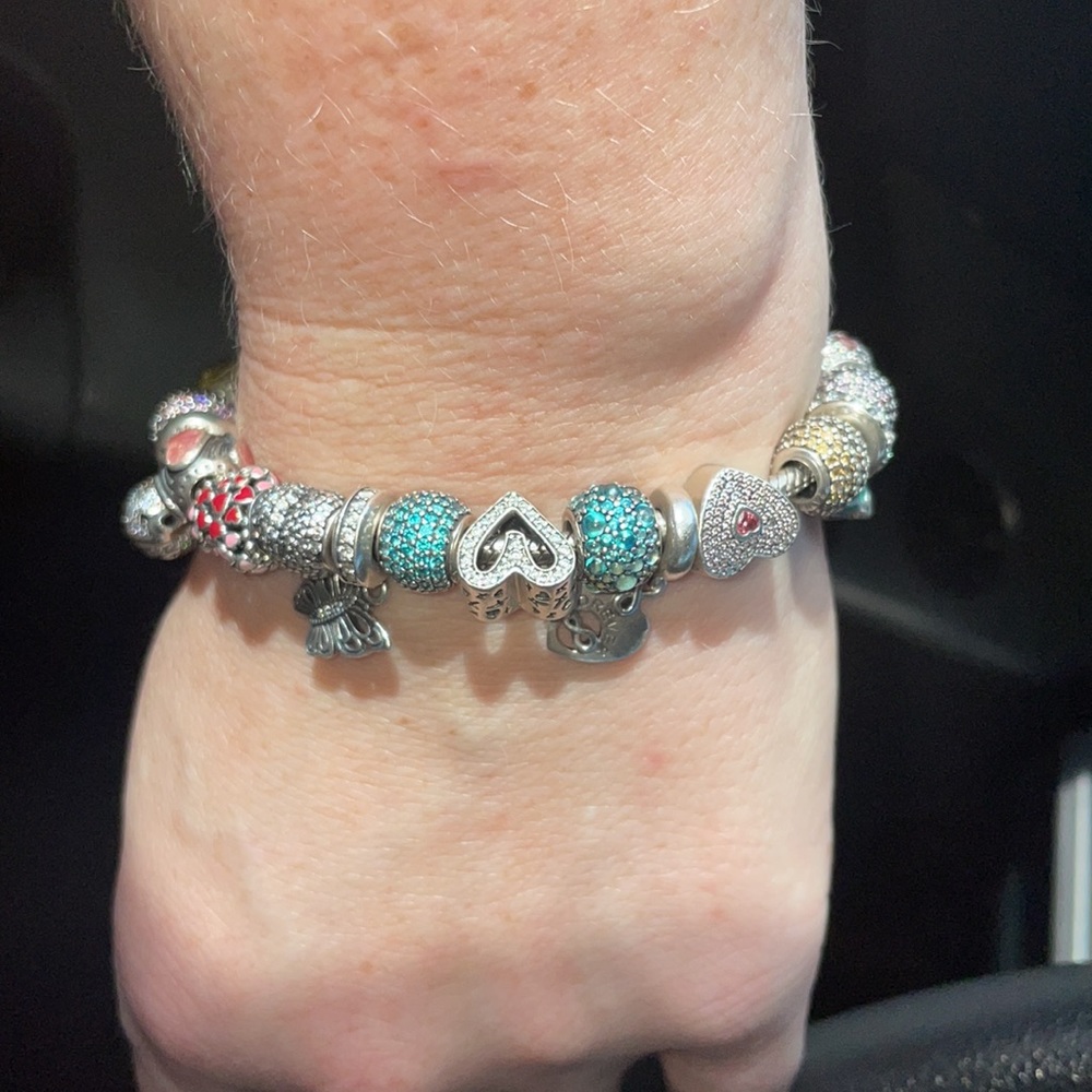 Authentic Pandora bracelet fully loaded with authentic charms